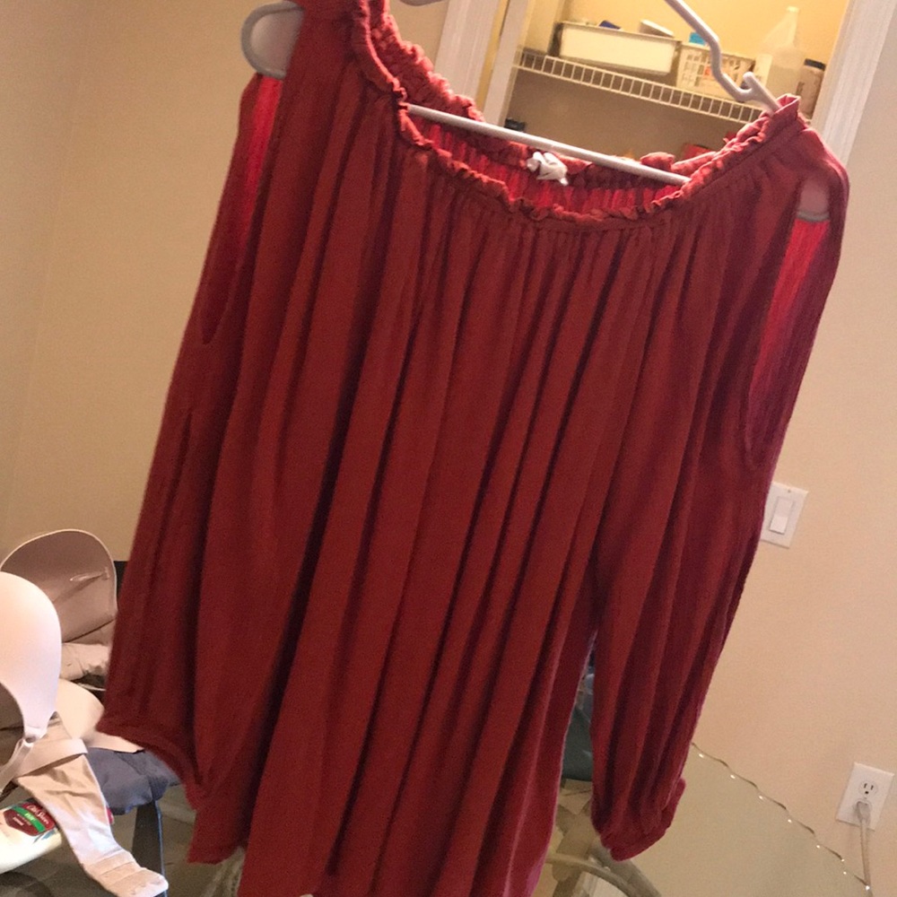 Orange off-the-shoulder shirt